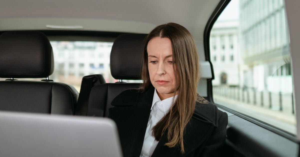 Did not declare travel partner in UK visa (business trip). How should I respond to immigration officer? - Woman in Black Blazer Sitting on Car Seat Did not declare travel partner in UK visa (business trip). How should I respond to immigration officer? - Woman in Black Blazer Sitting on Car Seat