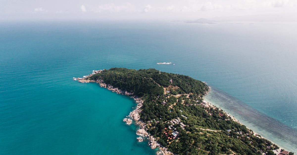 Differences between Si Amil Island and Mabul Island? - Green Trees on Island