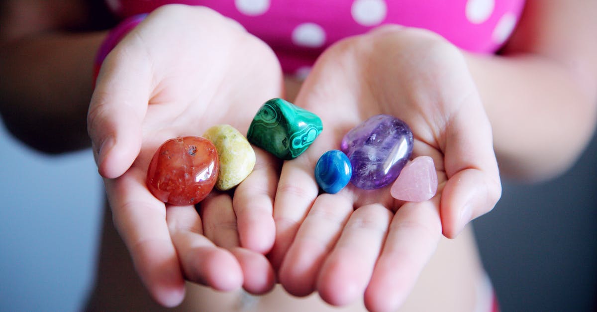 Differences between the Routes of the Camino de Santiago - Woman Holding Six Polished Stones