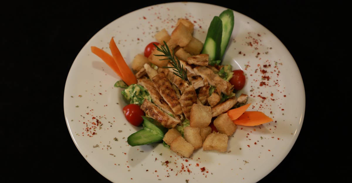 Dinner before claiming baggage - Cooked Food on White Ceramic Plate