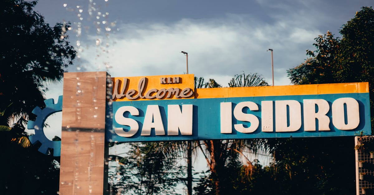 Disaster-driven tourism to newly-exposed locales [closed] - Welcome Sign in Close Up