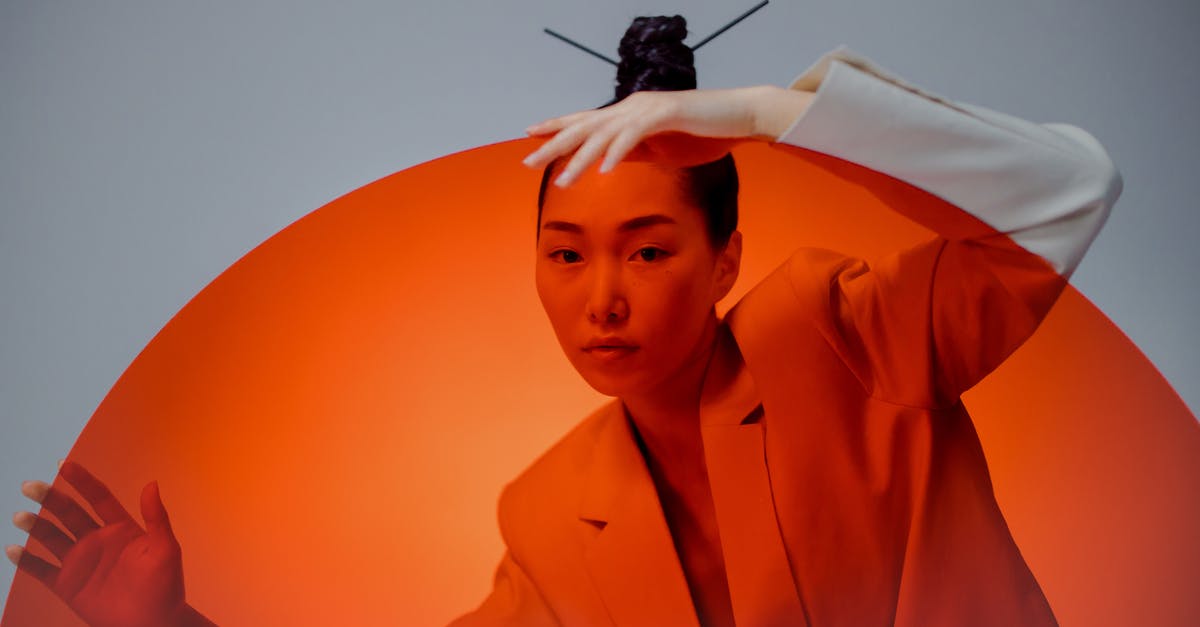 Discounts for Universal Studios Japan when it's your birthday? - A Woman in Coat Behind the Red Round Transparent Glass