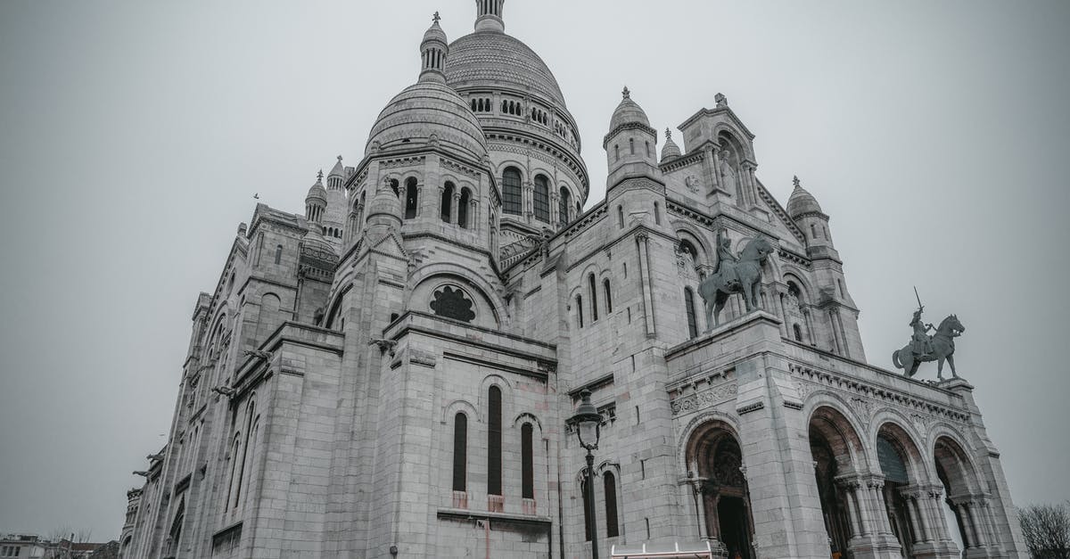 Disneyland Discount on Paris Visite Pass? - Grayscale Photography of Sacred Heart of Montmartre Basilica in Paris, France