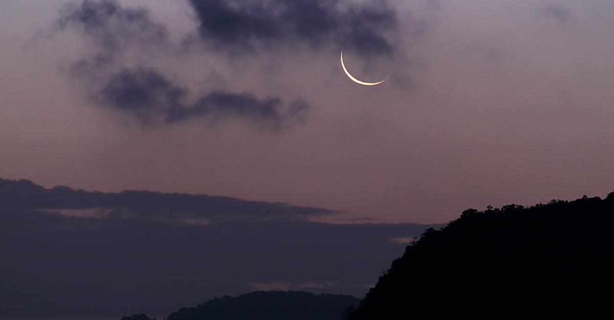 Dive shop availability and cost in Phuket and Koh Tao, Thailand - Silhouette of Mountain Under The Moon Covered With Clouds