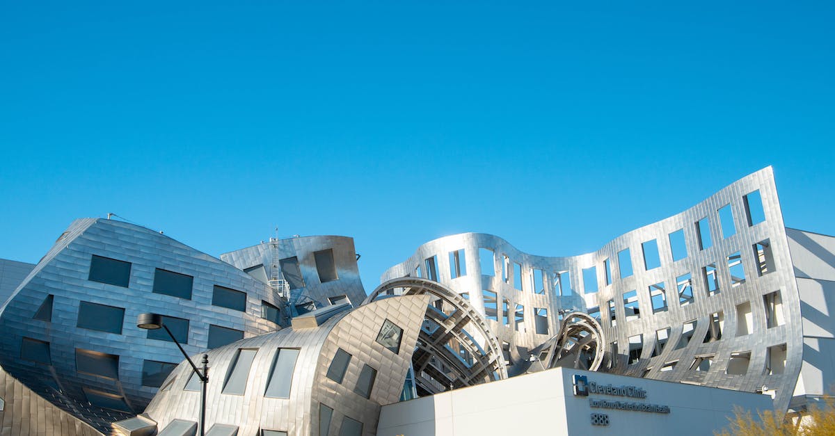 Do airlines block out a large section of seats online? - Contemporary quaint building of Lou Ruvo Center exterior with creative bendy walls on sunny day