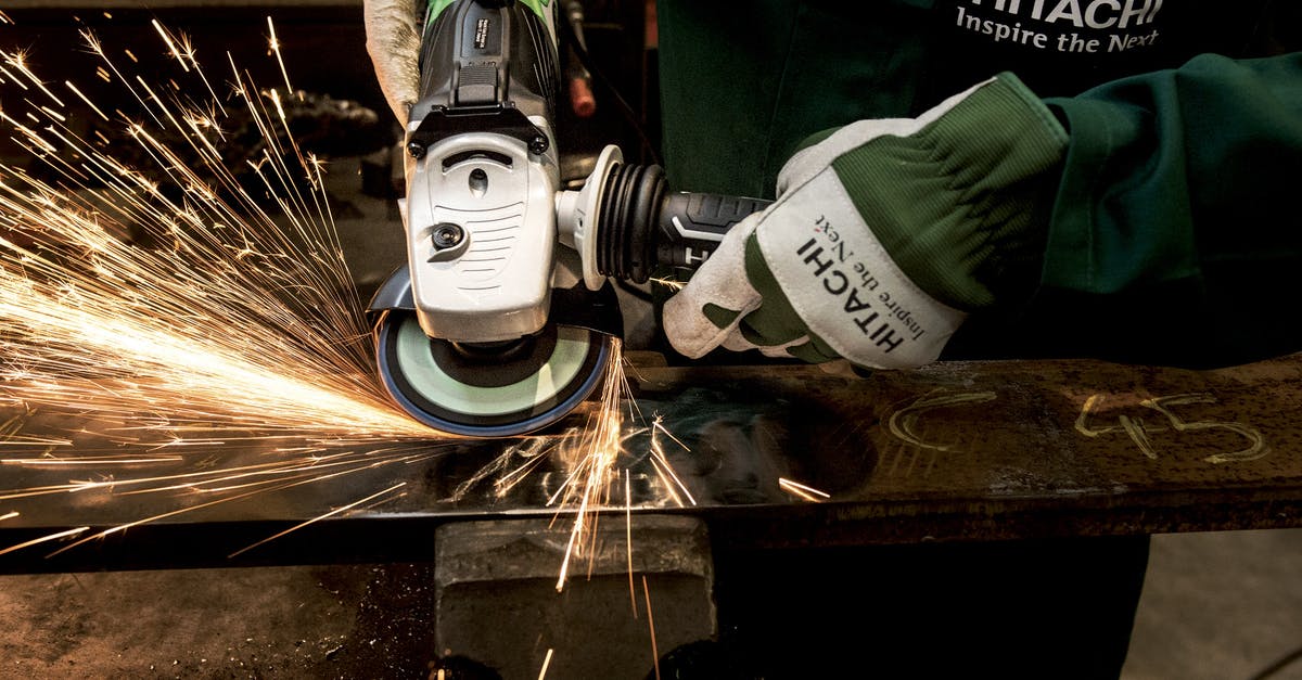Do airport metal scanners occasionally flash a false alarm on purpose? - Hitachi White Black Angle Grinder Do airport metal scanners occasionally flash a false alarm on purpose? - Hitachi White Black Angle Grinder