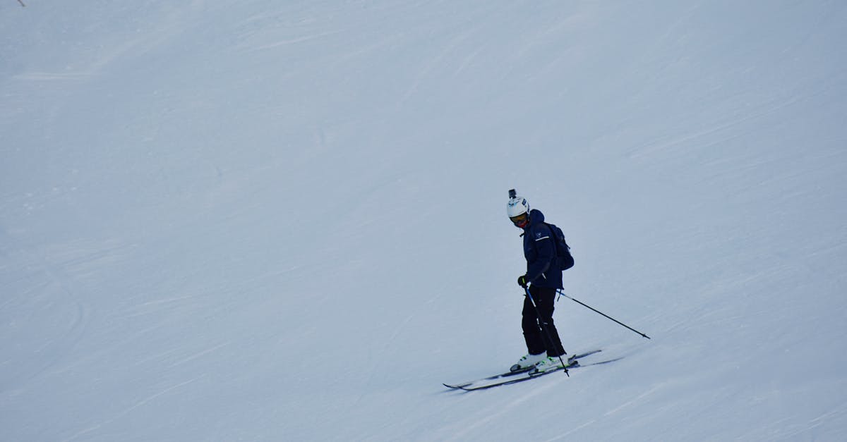 Do any of the ski resorts near Zurich offer late season (May) skiing? - Photo of Person Skiing
