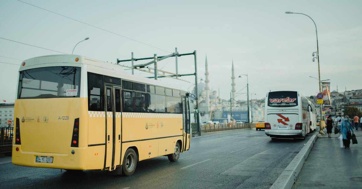 Do buses run on May 1st in Bavaria? - Yellow Bus on Road