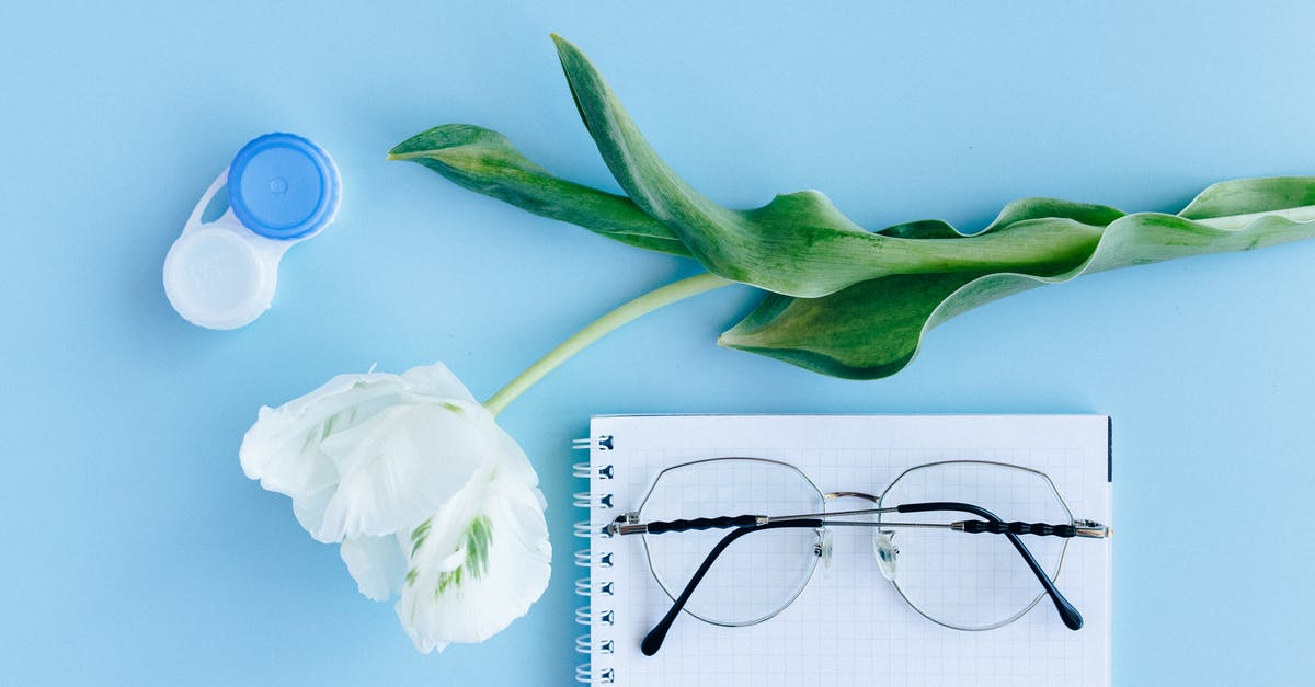 Do disposable contact lenses need to be declared as "liquids"? - White Rose Beside Blue and Silver Scissors