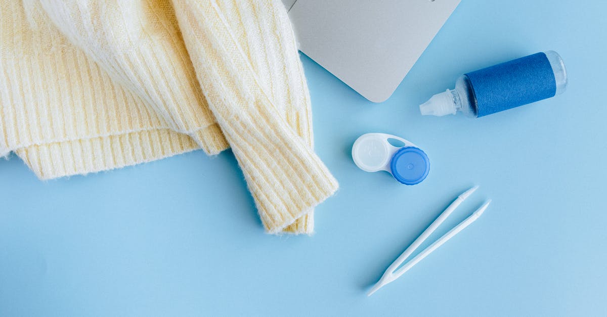 Do disposable contact lenses need to be declared as "liquids"? - White and Silver Click Pen Beside White and Black Laptop Computer