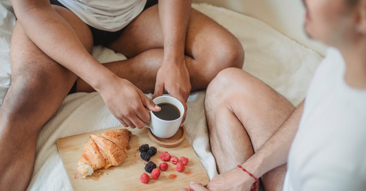 Do I have to declare my fruits flying into the EU? - Unrecognizable Partly Dressed Men Having Breakfast in Bed