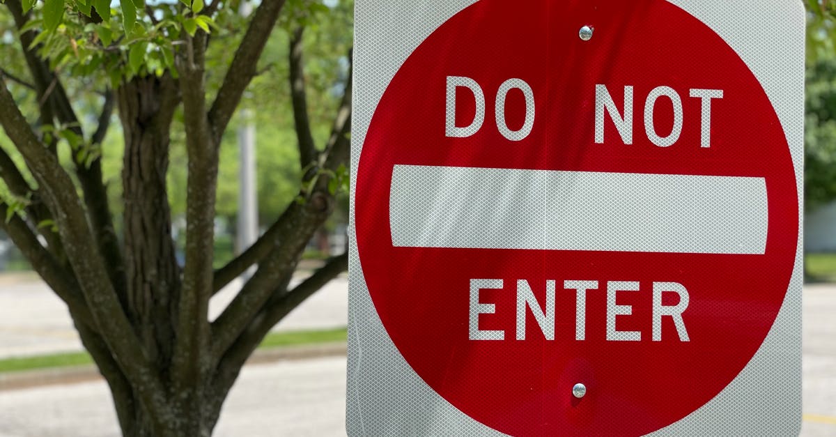 Do I need a visa to enter South Korea? - Red and White Stop Sign