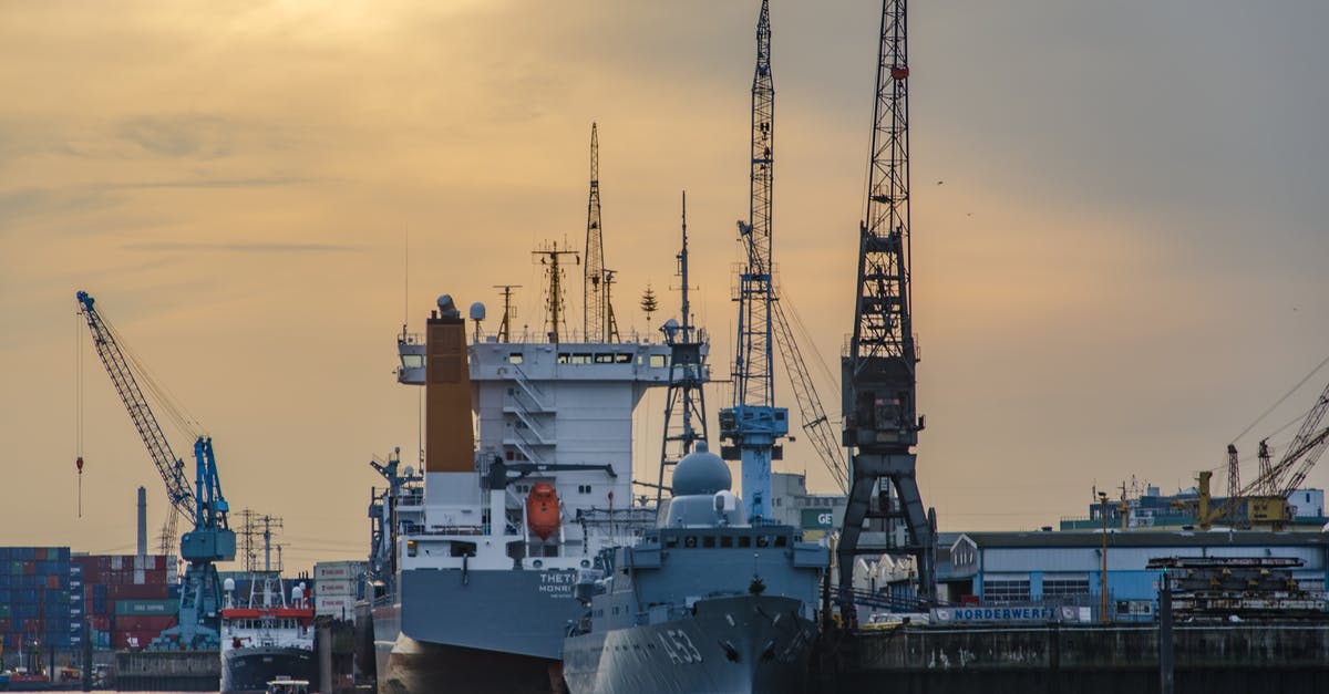 Do passengers and crew on cargo ships require visas? - Shipping Boat Near Dock