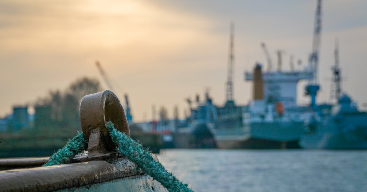 Do passengers and crew on cargo ships require visas? - Shallow Focus Photography of Green Rope