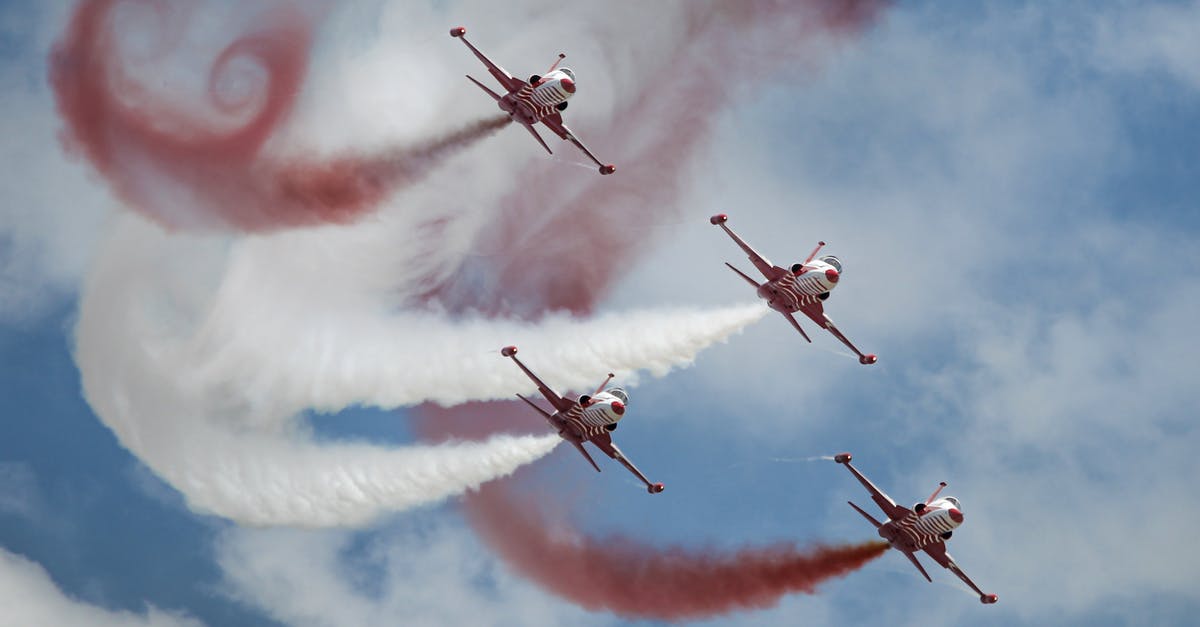 Do the Beijing-Tianjin high speed trains often get fully booked? - From below of flying fighters performing trick elements during air show in sunny day