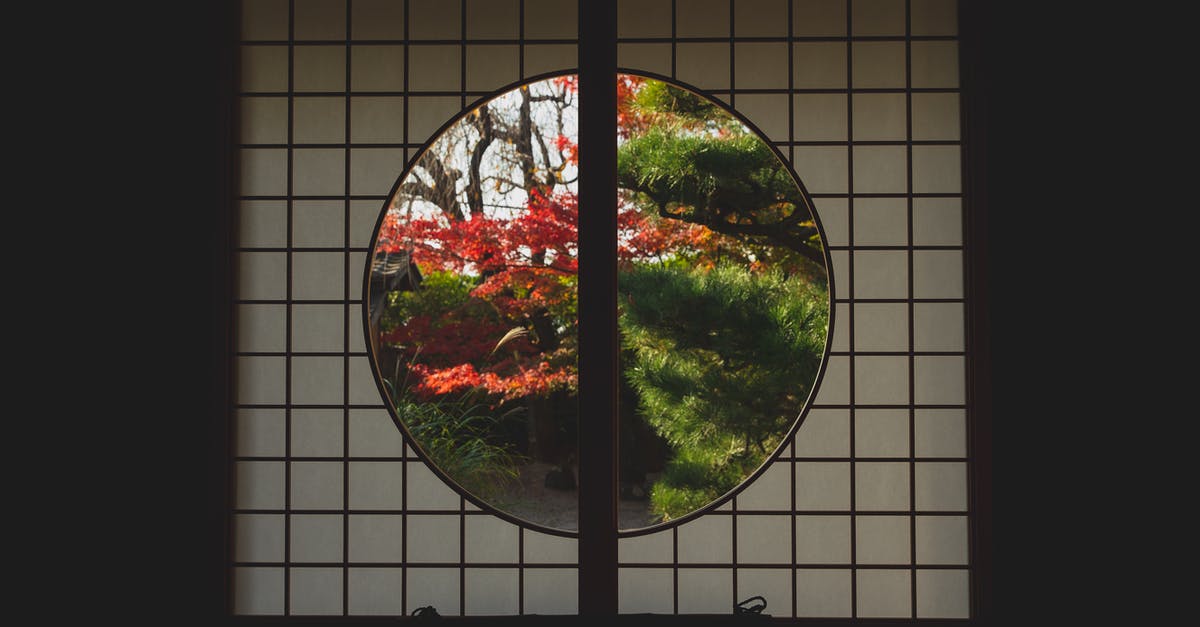 Do the Canadian Rockies lack red foliage in autumn? - Window in Japanese style with view of trees in autumn