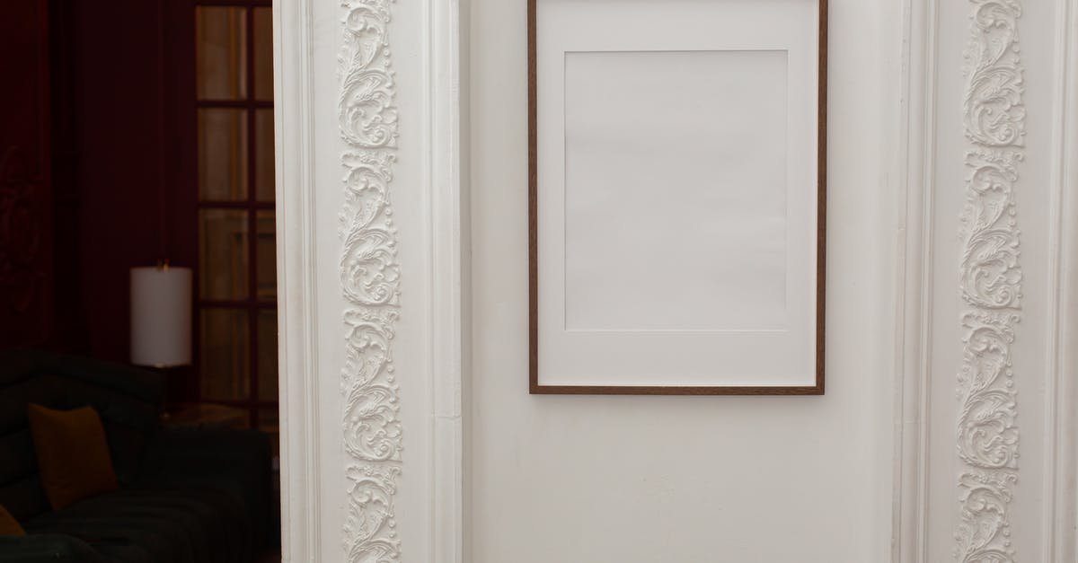 Do the Spanish domestic Trenhotel lines still operate? - Empty white frame hanging on wall with patterns