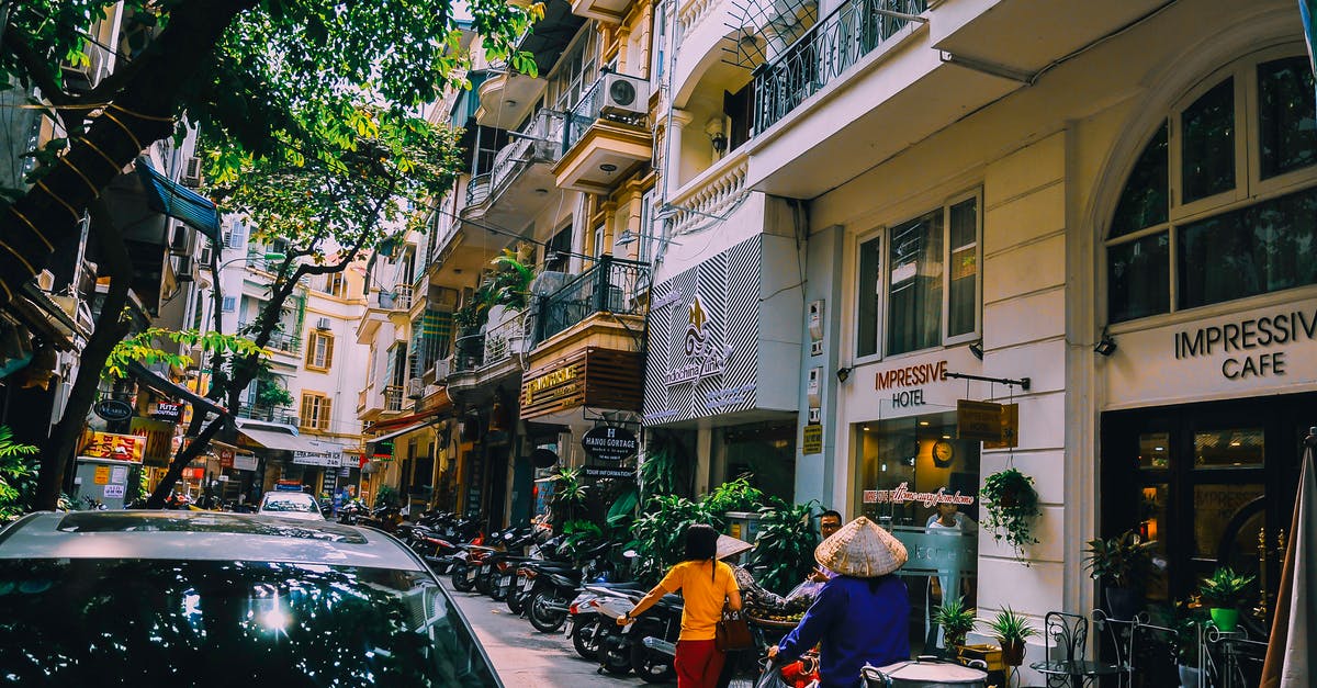Do UK citizens require a visa for Vietnam for tourist purposes? - People Walking in Front of Buildings Do UK citizens require a visa for Vietnam for tourist purposes? - People Walking in Front of Buildings