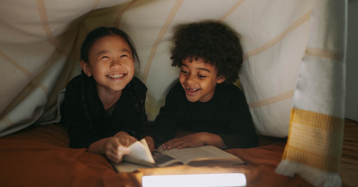 Do United's 787-9 Dreamliners have personal HDMI ports? - Girl And Boy Having Fun While Reading A Book