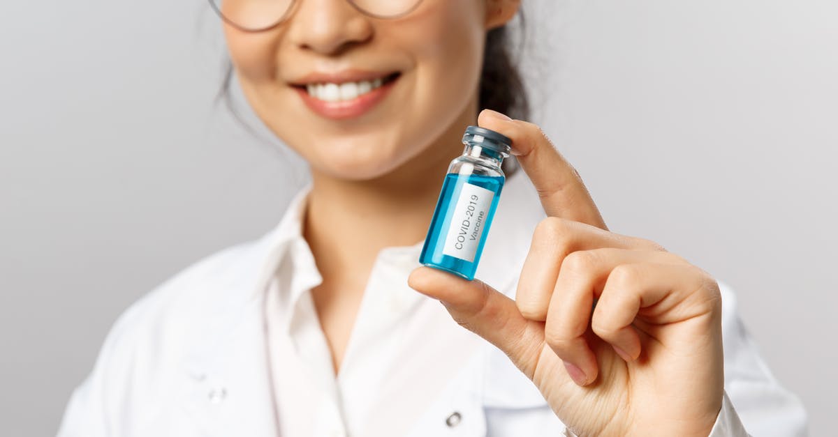 Do you get any protection from an incomplete vaccine series? [closed] - Close-Up Shot of a Woman Holding a Covid-19 Vaccine