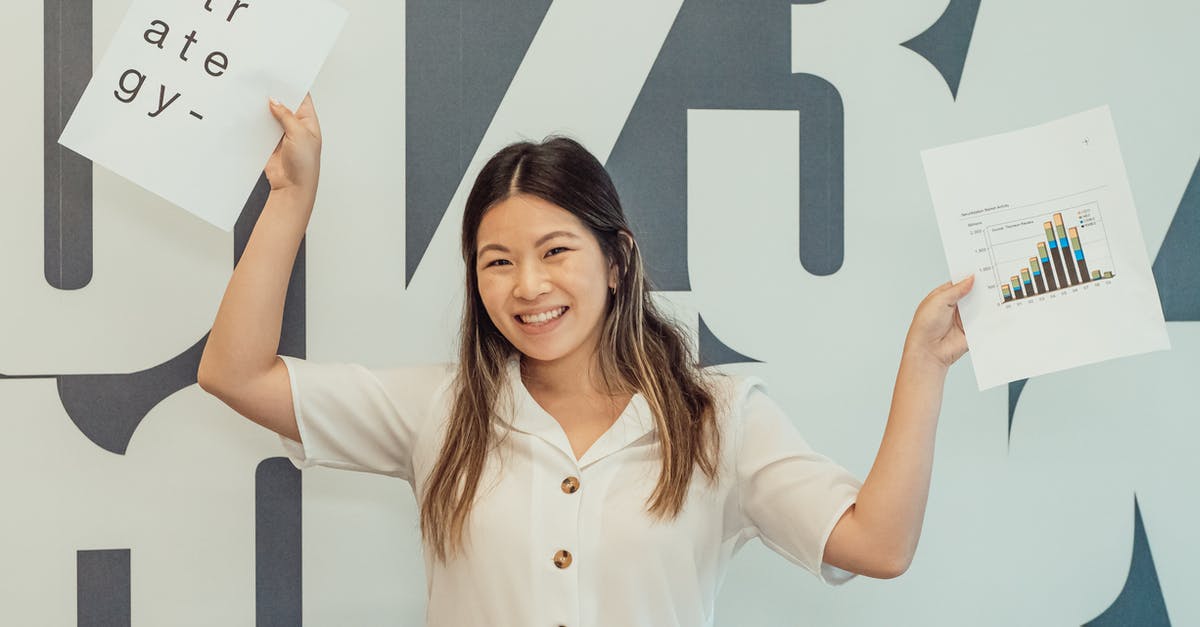 Documents for mainland Chinese citizen, traveling to HK from overseas - Woman Smiling while Holding Papers 