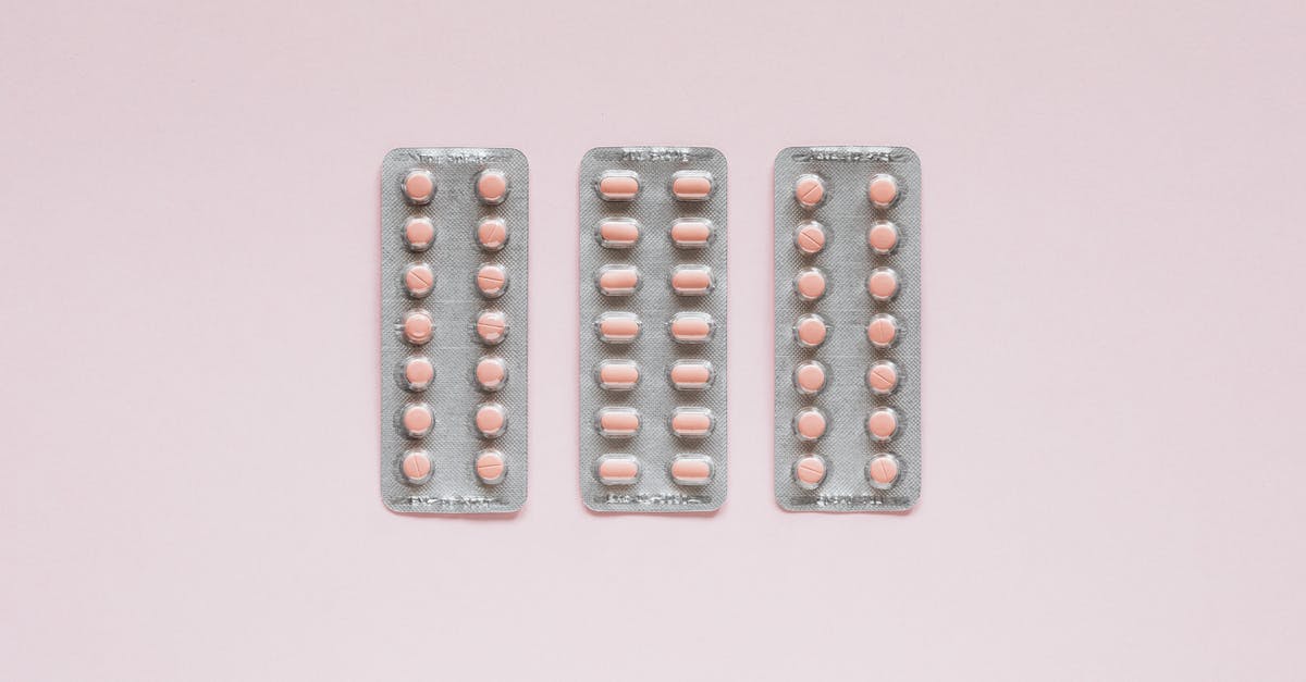 Does a drug charge preclude you from entering the UK? - Set of various medical pills on pink background