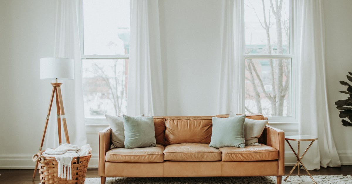 Does a seat cushion help for 12+ hour flights? - White and Brown Sofa Chair Near White Window Curtain