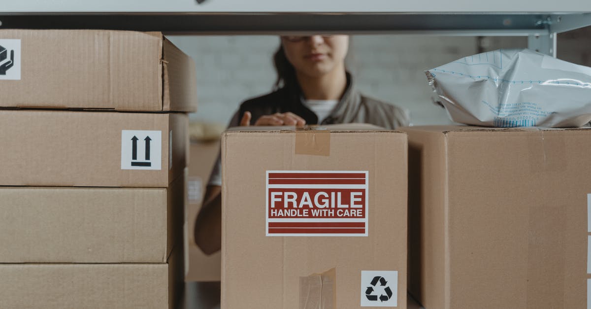 Does declaring your baggage as fragile do anything good? - Brown Cardboard Box with Fragile Sticker 