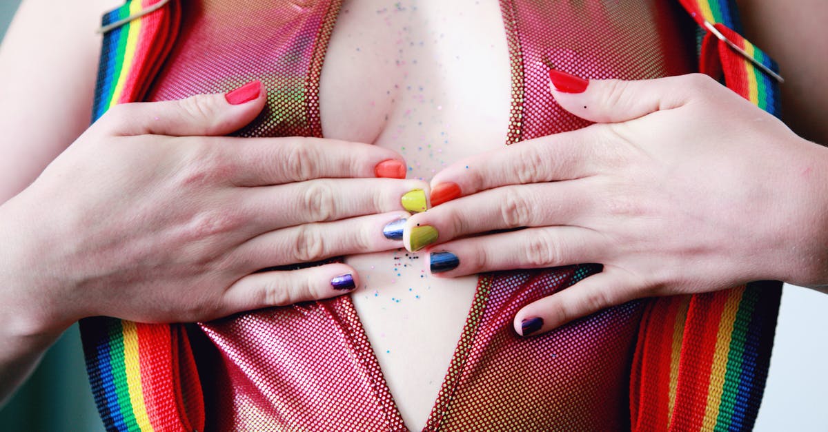 Does everyone get one free checked baggage allowance? [closed] - Woman With Multicolored Nail Polishes