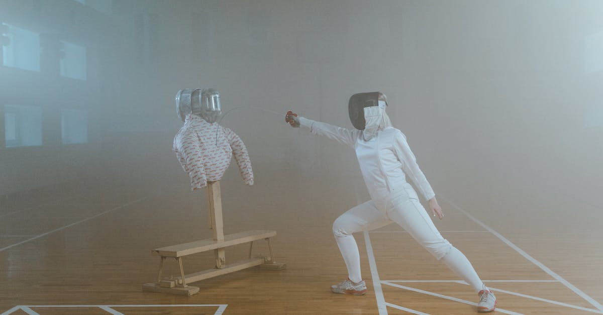 Does female sword fighting as entertainment still exist in Japan? - A Woman Practicing Fencing with a Dummy