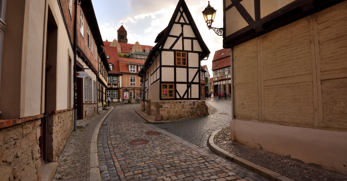 Does Germany enforce a six month passport rule? - Brown and White Concrete Houses Under White Clouds