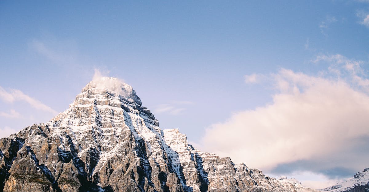 Does Kawartha Lakes/Peterborough County contain any high ground or lookouts? - Snowy ridge in mountainous terrain under cloudy sky Does Kawartha Lakes/Peterborough County contain any high ground or lookouts? - Snowy ridge in mountainous terrain under cloudy sky