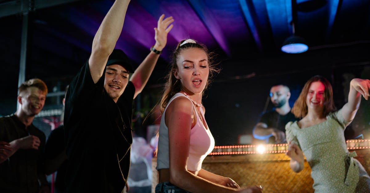 Does Mykonos have nightlife in September? - A People Dancing in the Club