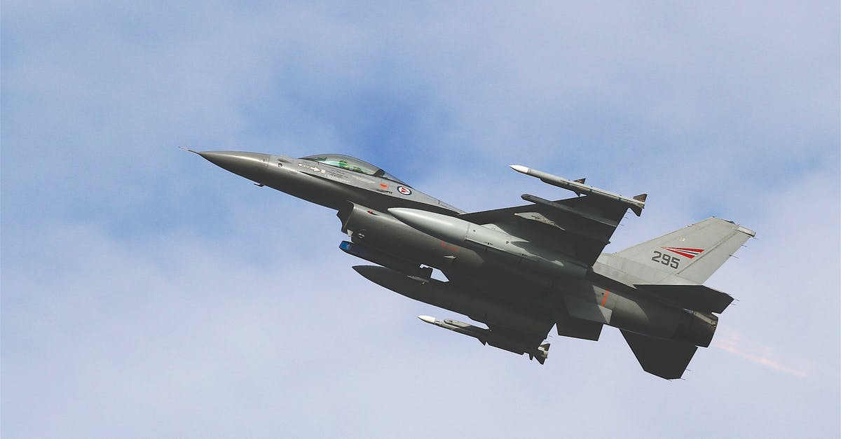 Does Norwegian overbook flights? - Black Jet Plane Flying Under Blue and White Sky during Daytime