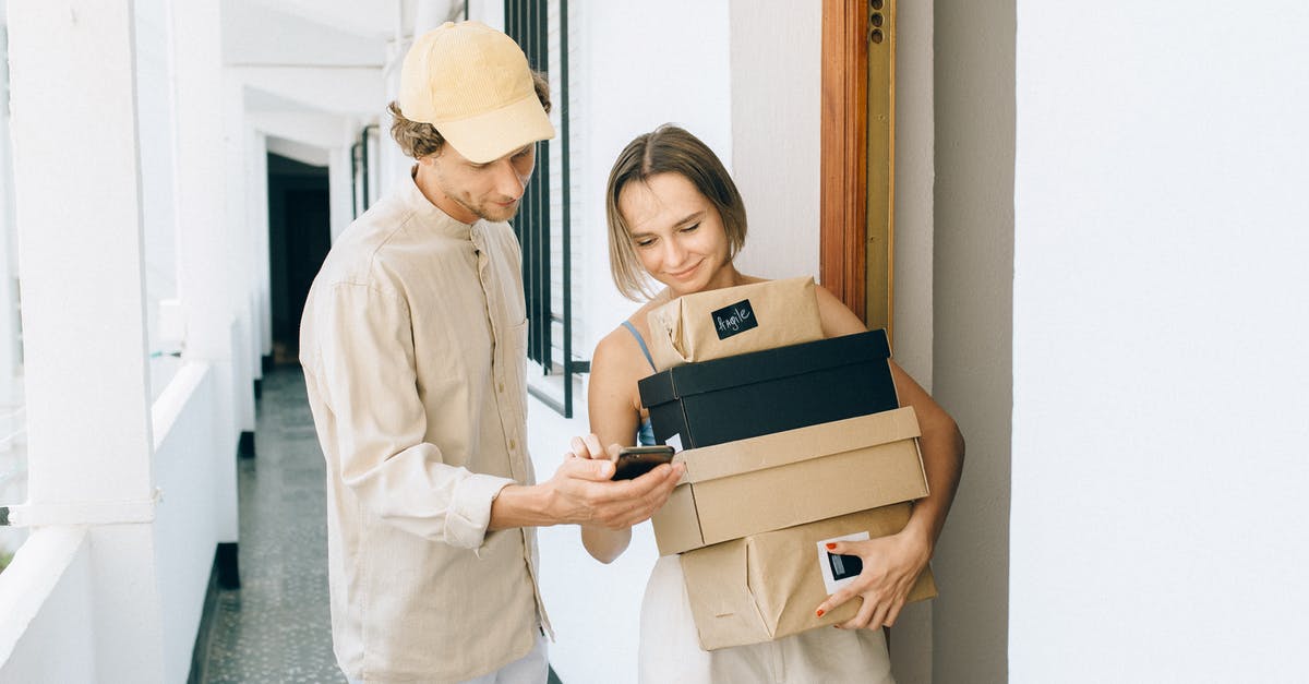 Does receiving visa quickly indicate good standing with UKVI? - A Woman Receiving Her Parcels while Standing Beside the Delivery Man