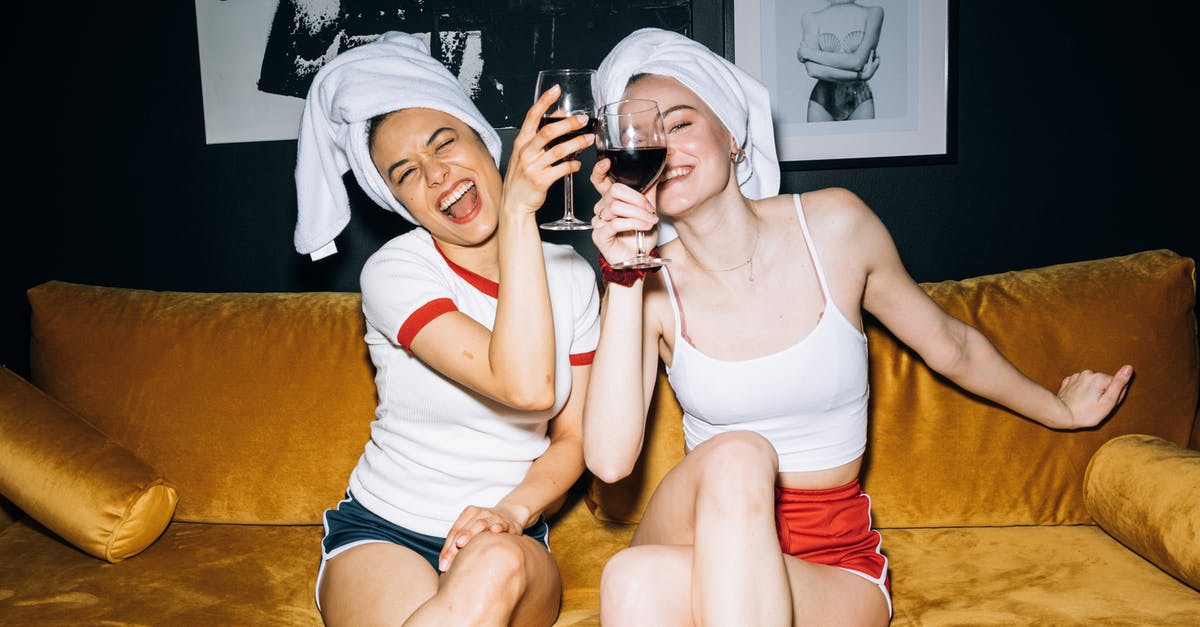 Does Southwest Airlines have assigned seating? [duplicate] - Two Young Women Sitting on a Yellow Sofa While Holding a Wine Glass With Red Wine