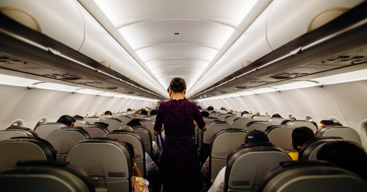 Does Southwest Airlines have assigned seating? [duplicate] - Person Standing Inside Airliner