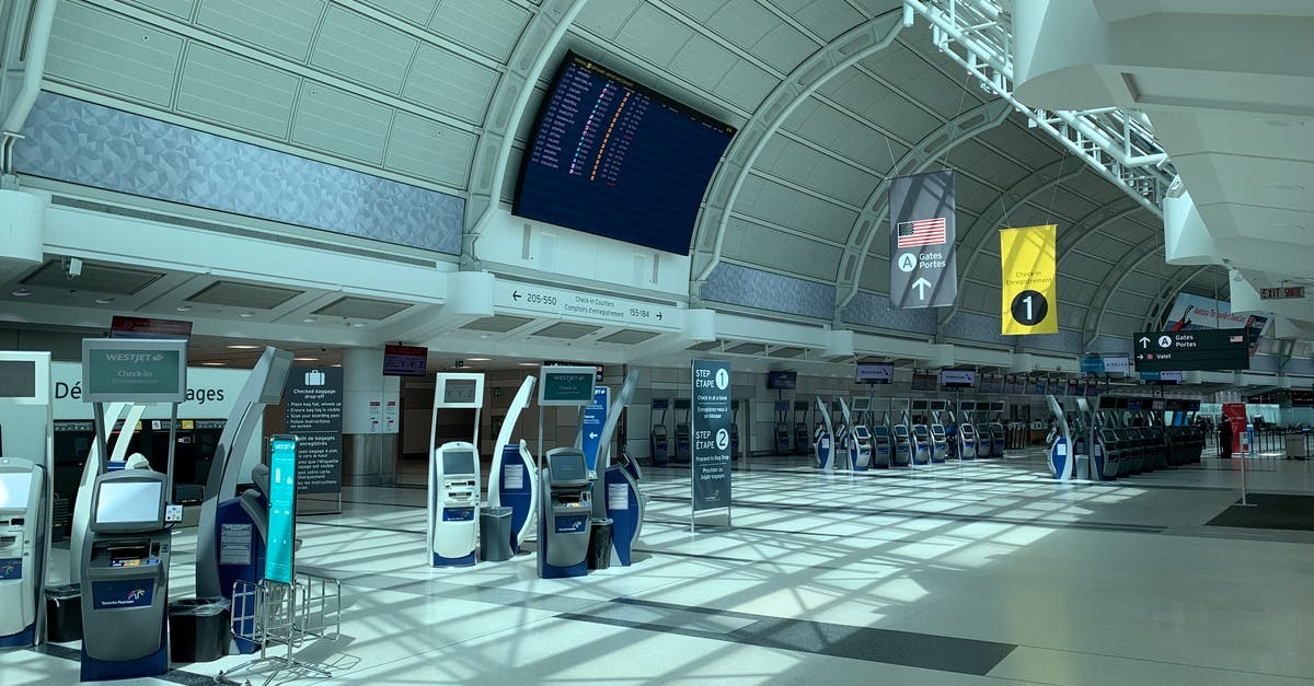 Does the boarding pass contain sensitive information after flight? - Creative design interior of contemporary airport with corridor under information board and signboards