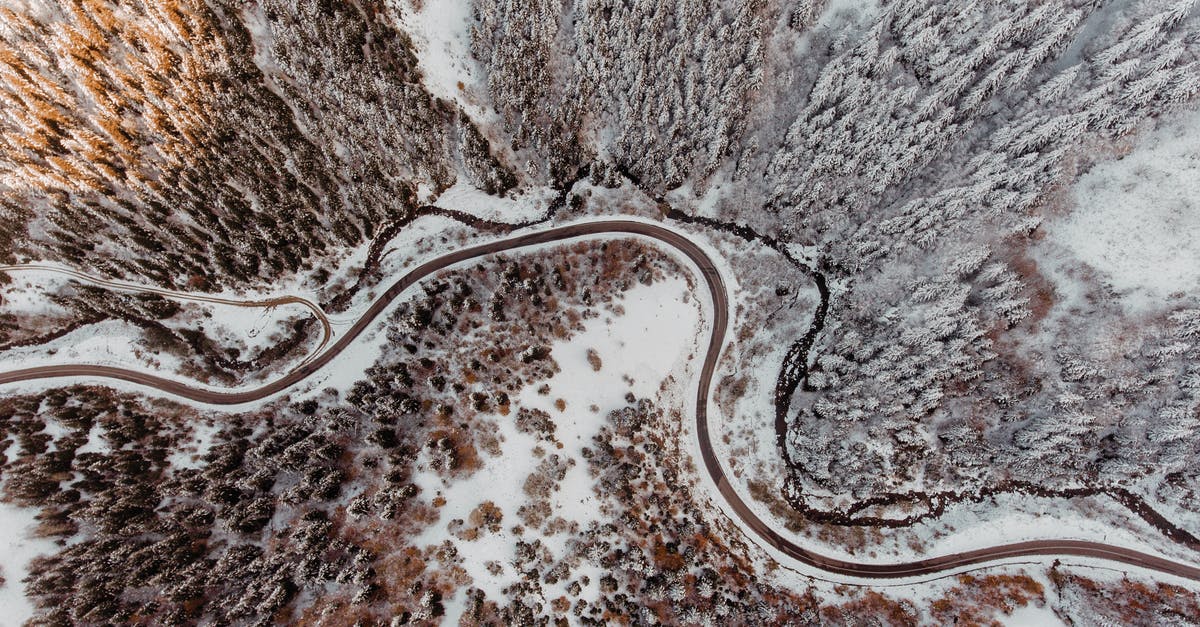 Does the JR East pass cover my route? - Drone view of curvy roads running through winter forest