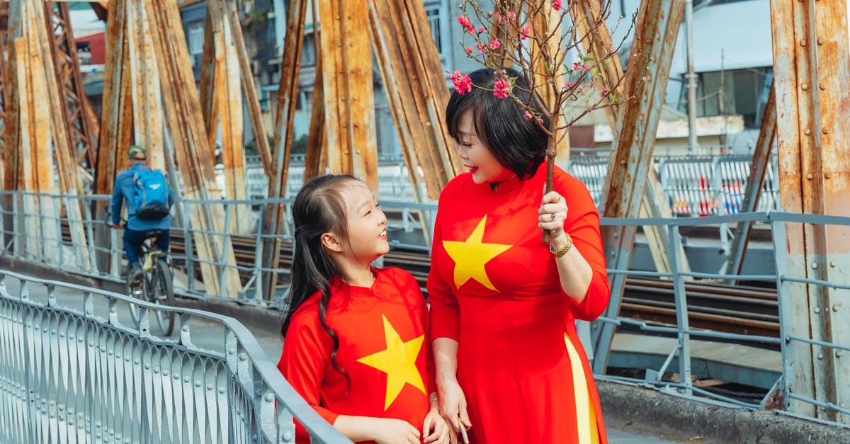 Does Vietnam allow concurrent passports? - A Mother and Daughter in the Bridge