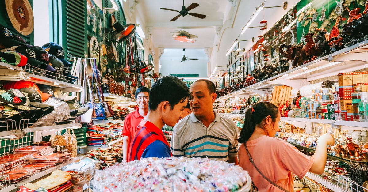 Does Vietnam store visas digitally? - Group of People Inside Store