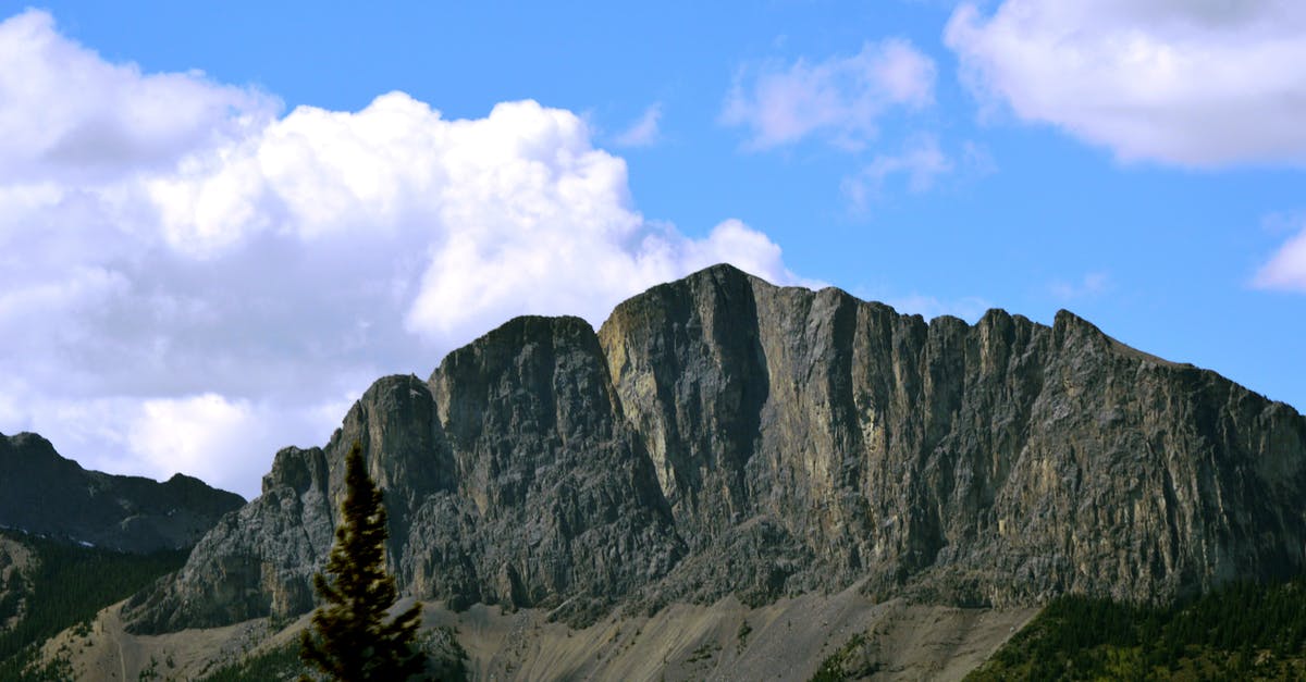 Does visiting Canada from USA under ESTA reset the visa waiver? - Mount Yamnuska under a Blue Sky with White Clouds 