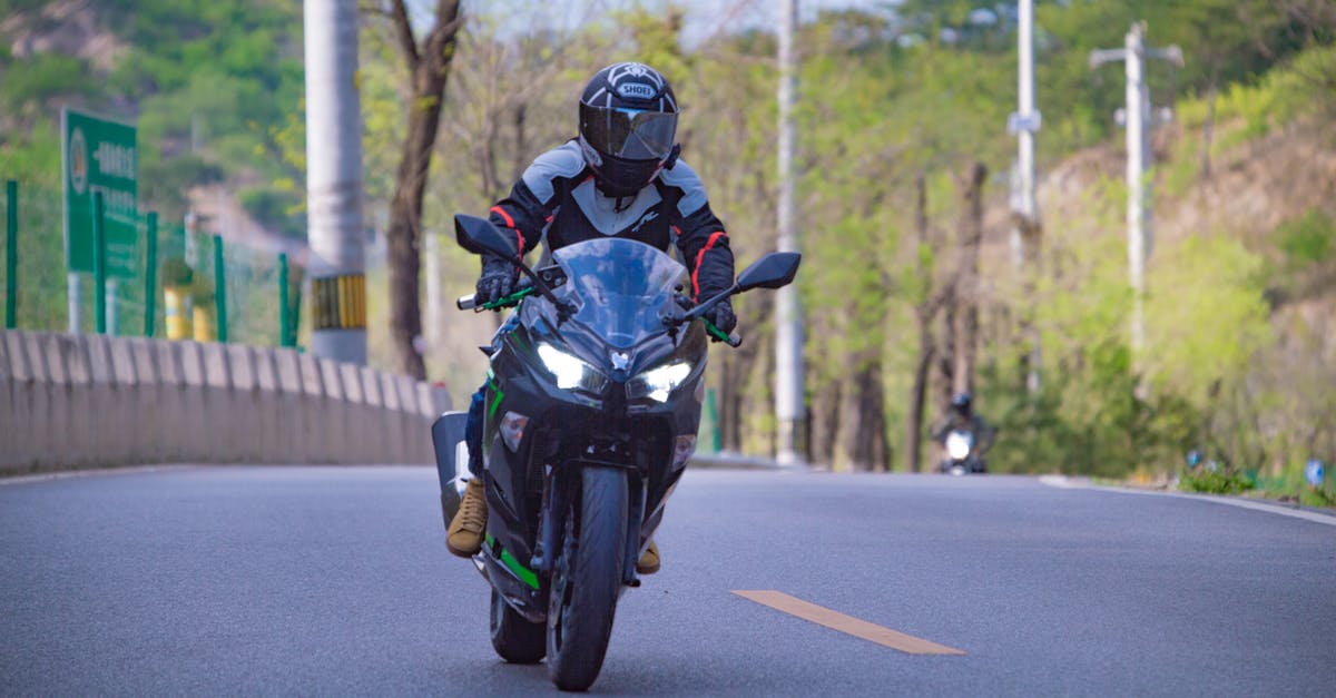 Driving a 125 ccm motorcycle in Spain with EU licence - Photo of Man Riding Motorcycle