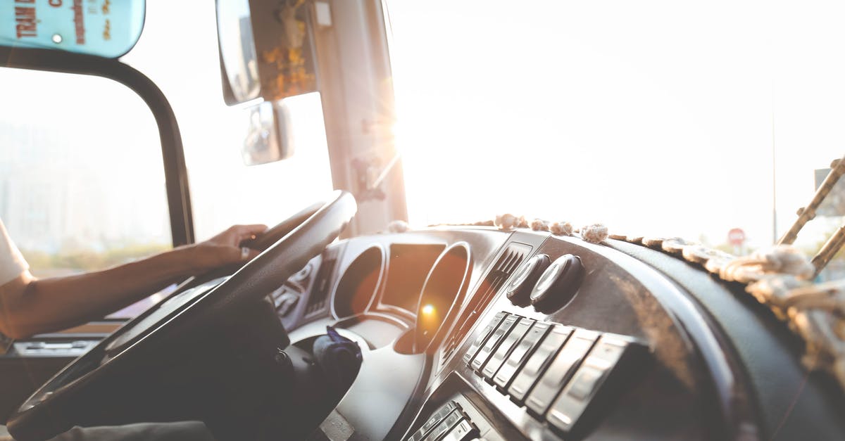 Driving a school bus in the USA - Person Hand On Steering Wheel