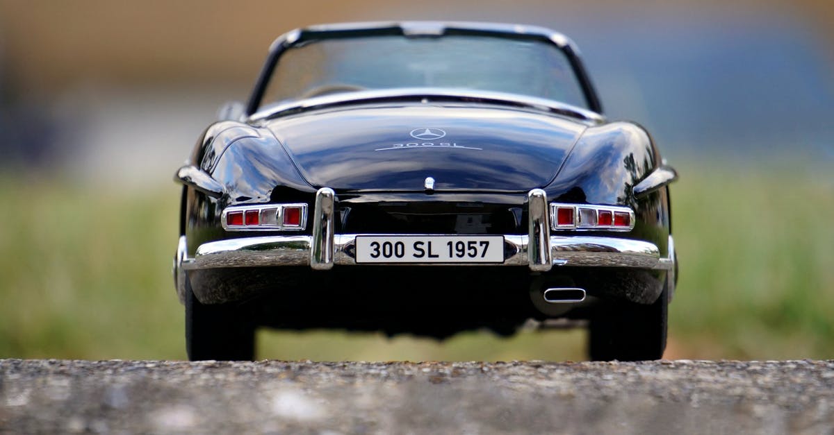 Driving in Dusseldorf´s low emission zone - Mercedes Benz Black Convertible Classic Car