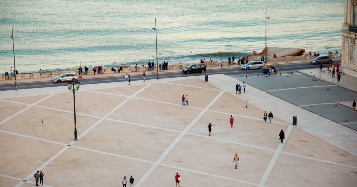 Dual Canadian / Irish Citizen moving to the UK - People walking on spacious city square on waterfront