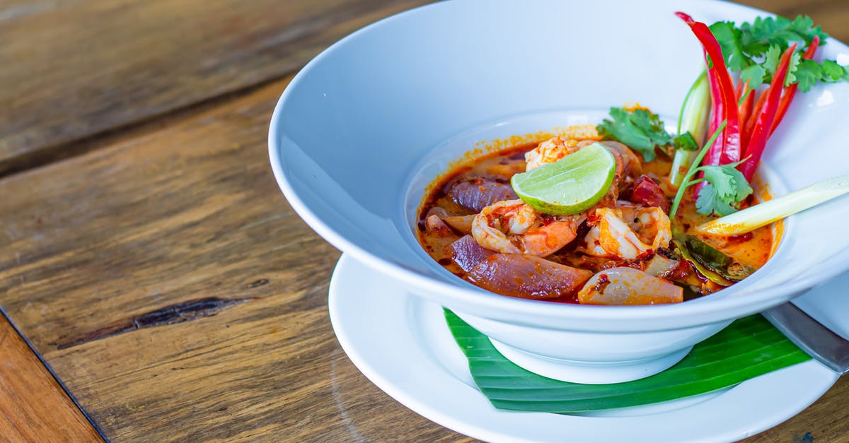 Dual Citizen - Ireland/UK entering Thailand - Tom Yum Soup in White Ceramic Bowl