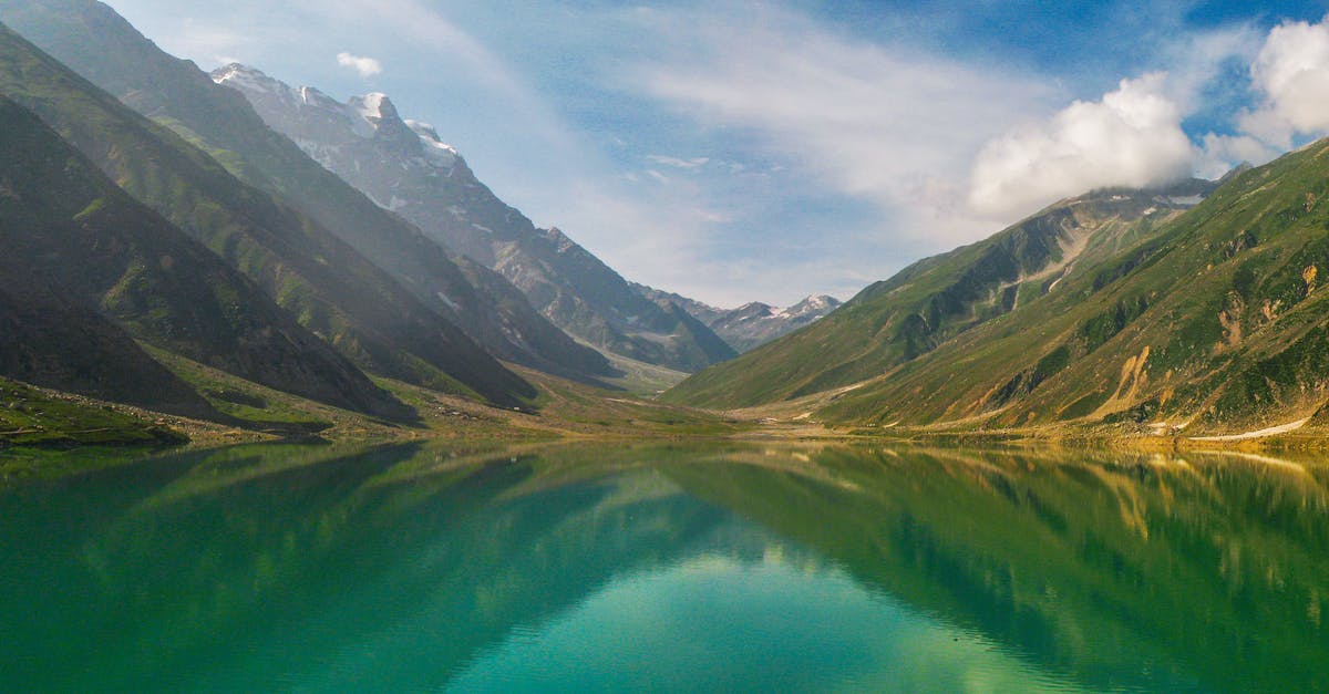 Dual citizen entering Pakistan with expired Pakistani passport - Green Lake Surrounded by Mountain