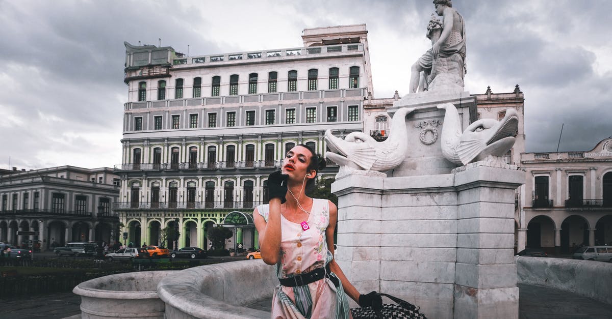 Dual Citizen (US/UK) Cuba Travel - A Person Posing Beside a Statue Monument