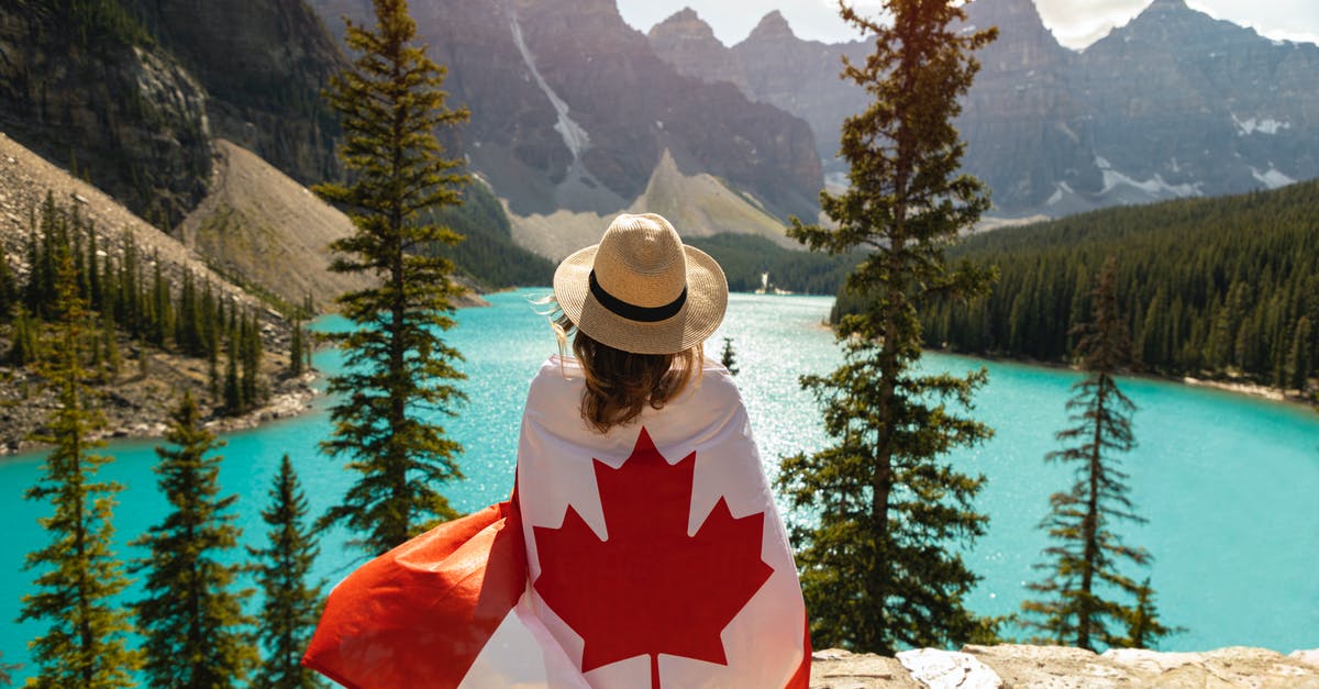 Dual UK/Canadian Citizens travelling to USA and Canada [duplicate] - Woman Draped In A Flag Of Canada